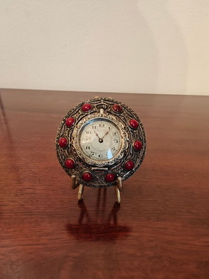 Small decorative clock used, with stand, not working