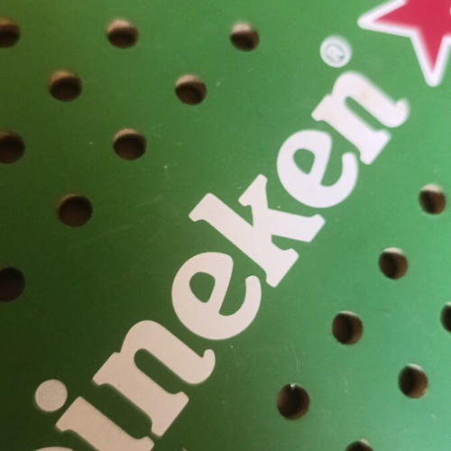Heineken wooden promotional paddle with color defect