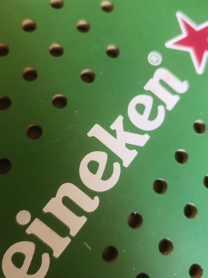 Heineken wooden promotional paddle with color defect