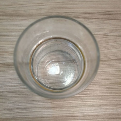 Decorative glass candle holder vase used with gold design