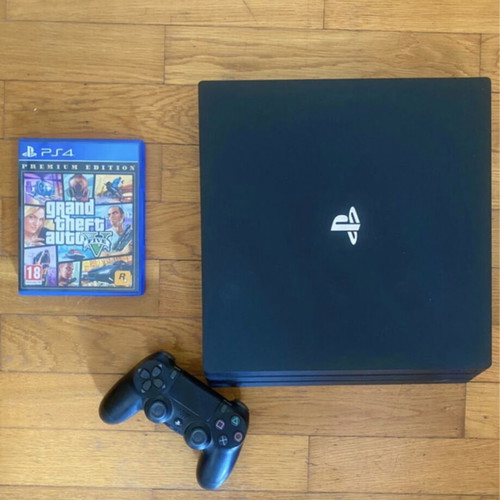 Sony PlayStation 4 Pro 1TB gaming bundle with controller and GTA V