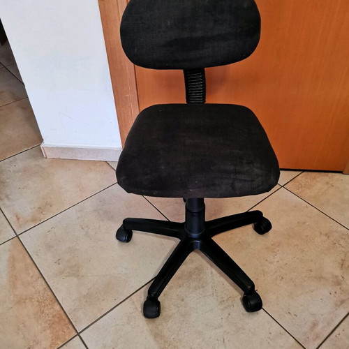 Office chair used, black swivel