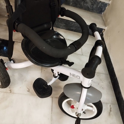 Lorrelli Neon tricycle used with rotating seat and canopy
