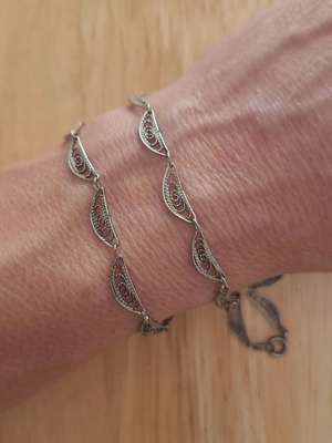Vintage necklace used, silver color, intricate design