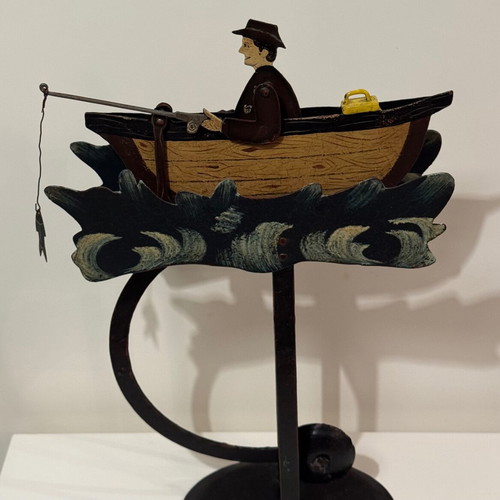 Vintage style folk art pendulum with fisherman in boat used
