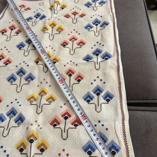 Handmade table runners with colorful and blue-white designs