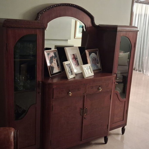 Large wooden antique sideboard with glass cabinets and mirror