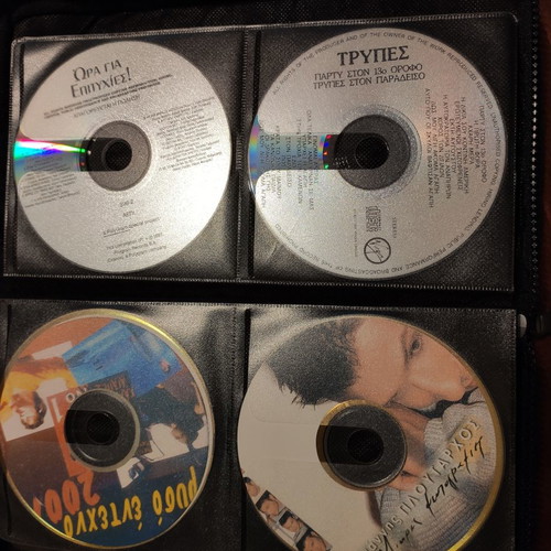 Set of 48 used music CDs with free case