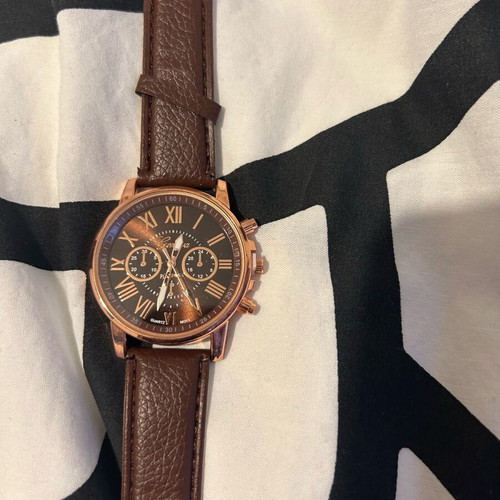 Unisex wristwatch new with brown synthetic leather strap