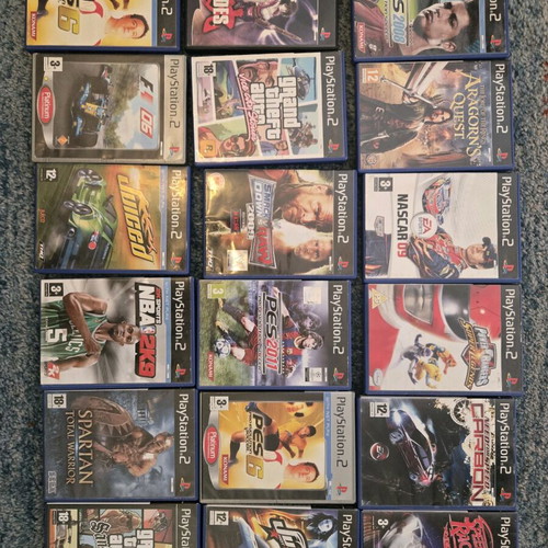 Ps2 games pack with 18 used games in their cases