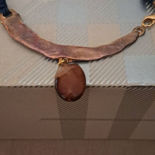 Handmade necklace in excellent condition with metal and stone