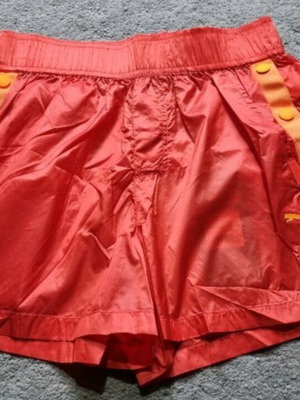PUMA Fenty by Rihanna women's orange shorts size small with side poppers