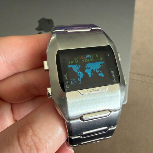 Fossil OLED JR-9465 watch like new, unisex, silver metal band
