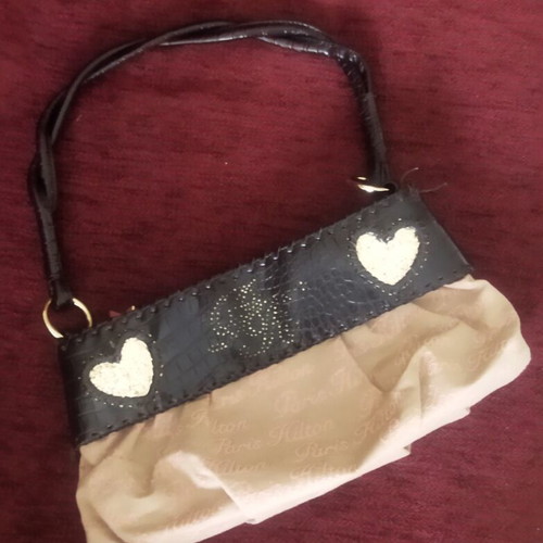 Paris Hilton shoulder bag Y2K style with glitter details