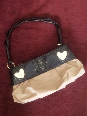 Paris Hilton shoulder bag Y2K style with glitter details