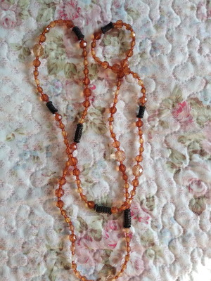 Long necklace like new, brown and orange