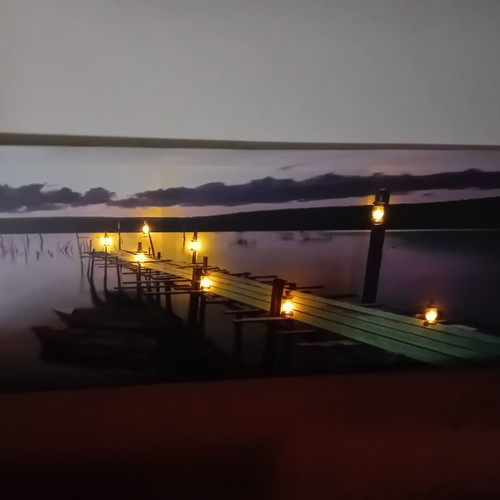 Decorative wall art with LED lighting used, sunset pier design