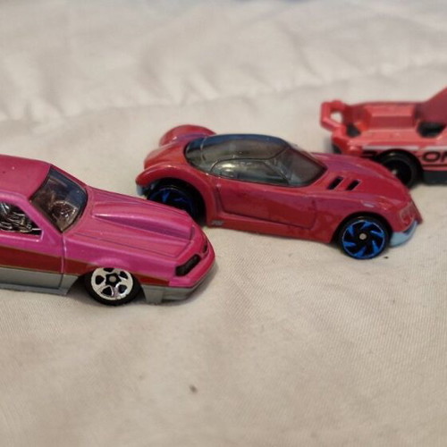 Pink Hot Wheels toy cars like new, pink color