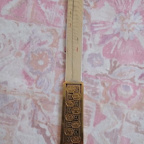 Papercutter like new decorated with geometric patterns
