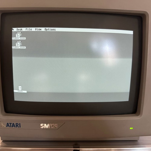 Atari 1040STFM with Atari SM124 monitor, original mouse and Greek manual used
