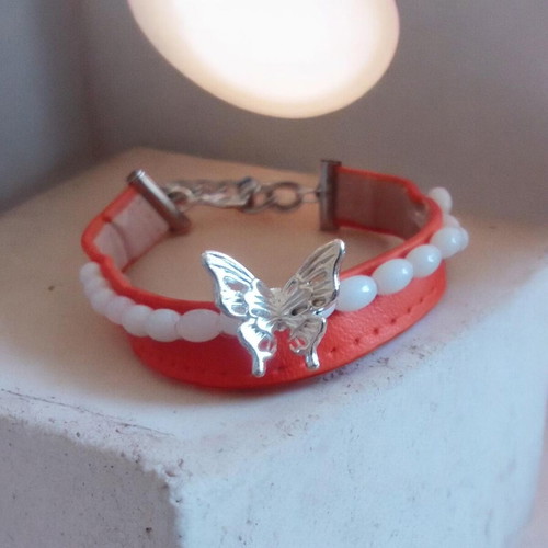 Handmade bracelet with beads on leatherette