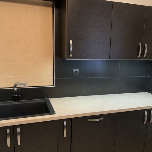 Kitchen cabinets like new with built-in Pitsos oven and island