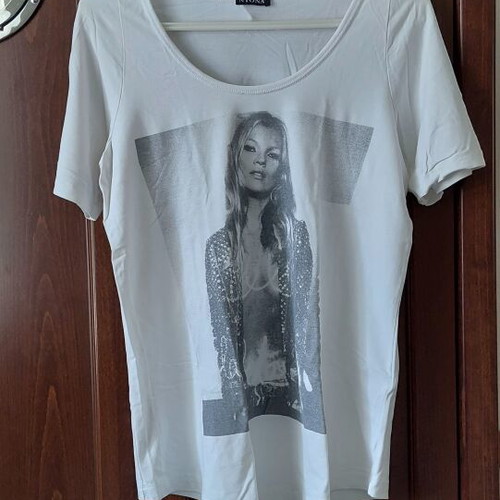 White T-shirt medium size used for women