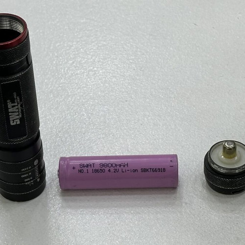 Swat NK-X613 Professional Light flashlight used, rechargeable 9800mAh battery