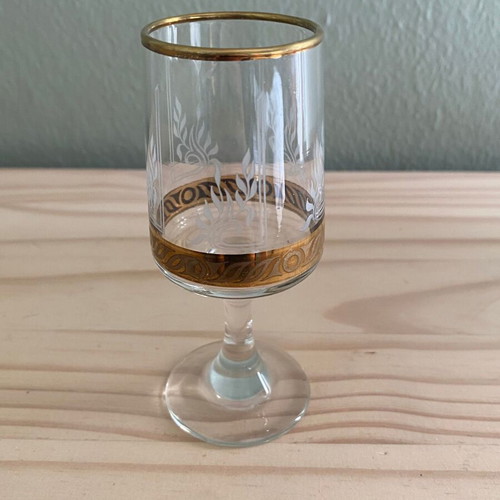Liqueur glass used with gold design and etched pattern