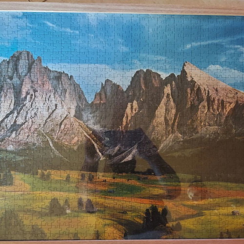 Framed puzzle like new, dimensions 0.53x0.73 m