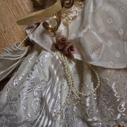 Glass Bride Doll like new with lace dress and hat
