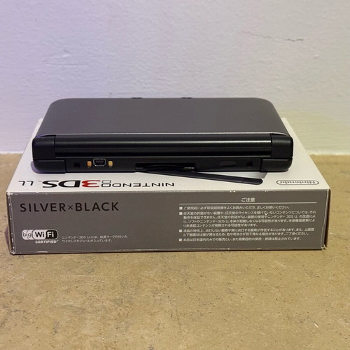 Nintendo 3DS XL Silver x Black console with games