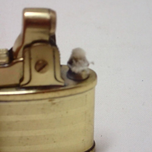 Vintage Penguin K Automatic Lighter made of brass, like new