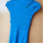  Μπλούζα πλεχτή κοντομάνικη σε μπλε τυρκουάζ χρώμα με μεταλλικά νήματα για κορίτσι 7-10 ετών σε άριστη κατάσταση.