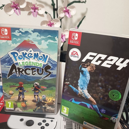 Nintendo Switch with three games