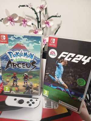 Nintendo Switch with three games