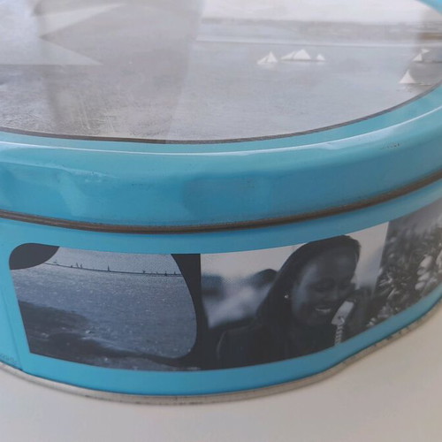 Maersk metal biscuit tin used with some dents