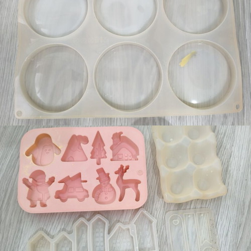 Craft supplies set used with clay, paints, silicone molds, and accessories
