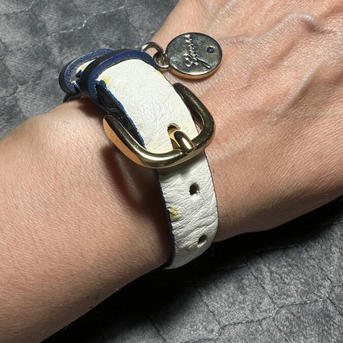 Guess bracelet new, white and gold colors