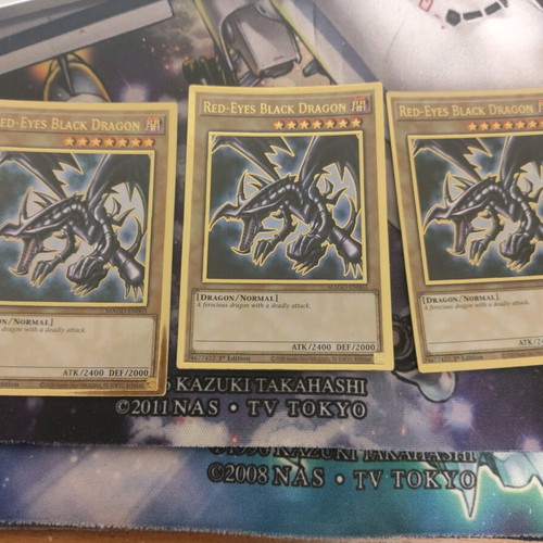 Red-Eyes Black Dragon Yu-Gi-Oh cards premium Gold rare, like new, set of 3