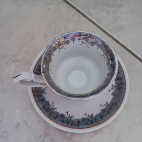 Small cup with saucer used, porcelain