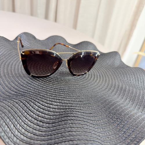 AnaHikmann sunglasses used, brown and gold