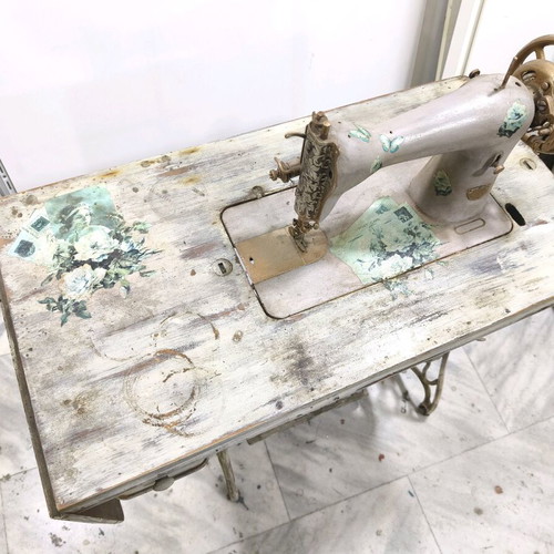Singer sewing machine decorated with decoupage and aging, used