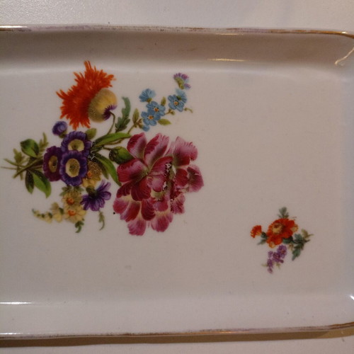 Porcelain tray used with flowers and golden accents