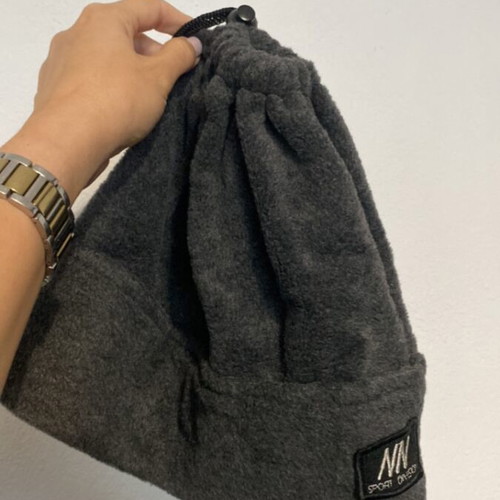 Gray knit cap like new with opening for ponytail