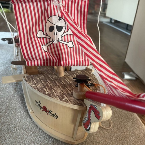 Wooden pirate ship used with small break and marker stains