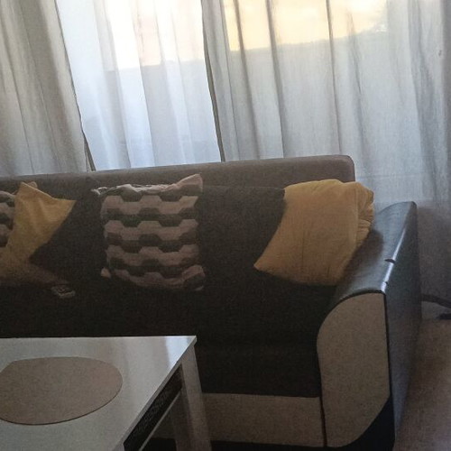 Sofa with decorative cushions