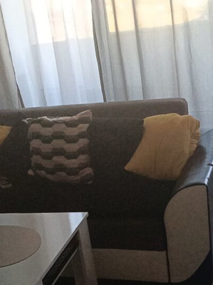 Sofa with decorative cushions