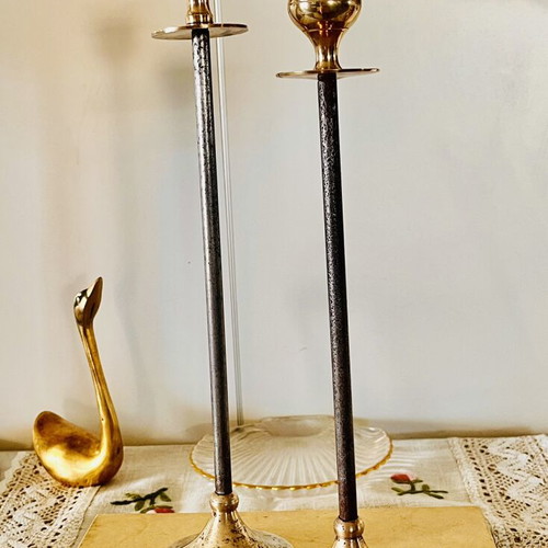 Vintage brass candlesticks with thin iron stems used
