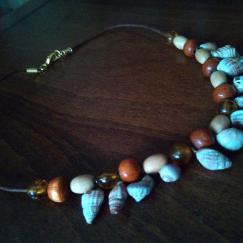 Shell and wooden bead necklace on leather strap used, summer style